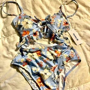 Hurley One piece floral swimsuit with adjustable tie on the back & shoulders